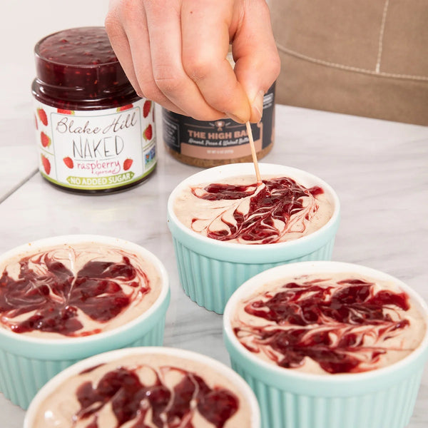 Walnut Butter Cheesecake with Raspberry Swirl